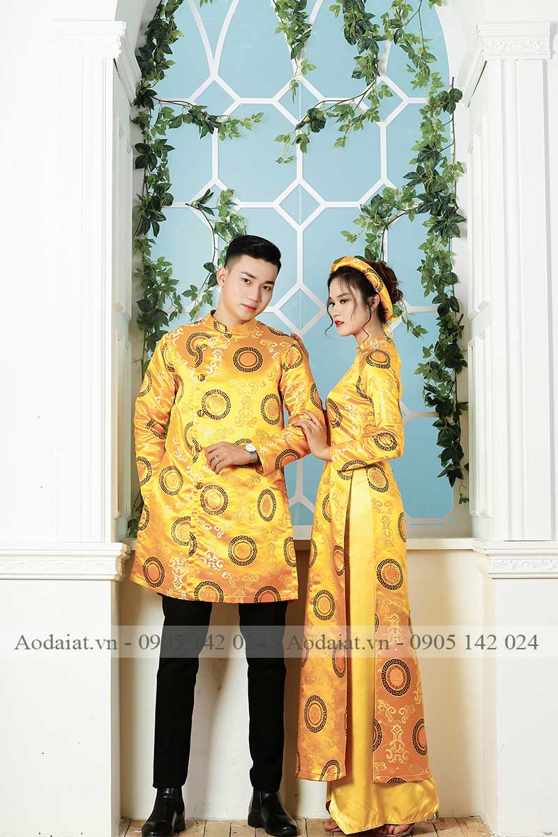 Mẫu áo dài cưới AT màu vàng đồng sang trọng